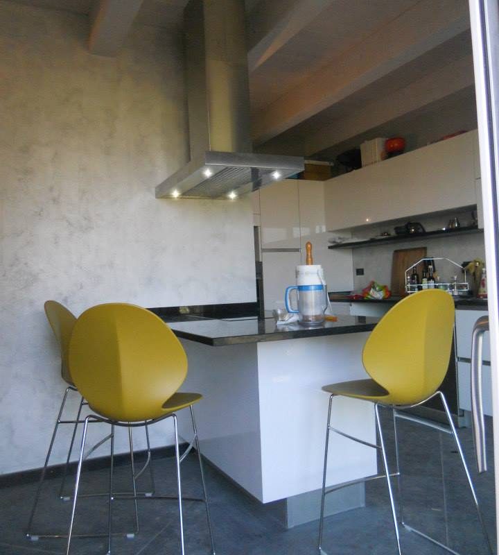 cucina faenza laccato bianco lucido piano in marmo nero africa isola cappa inox sgabelli basil calligaris cucina snaidero arredamento cucine ozzano emilia san lazzaro bologna